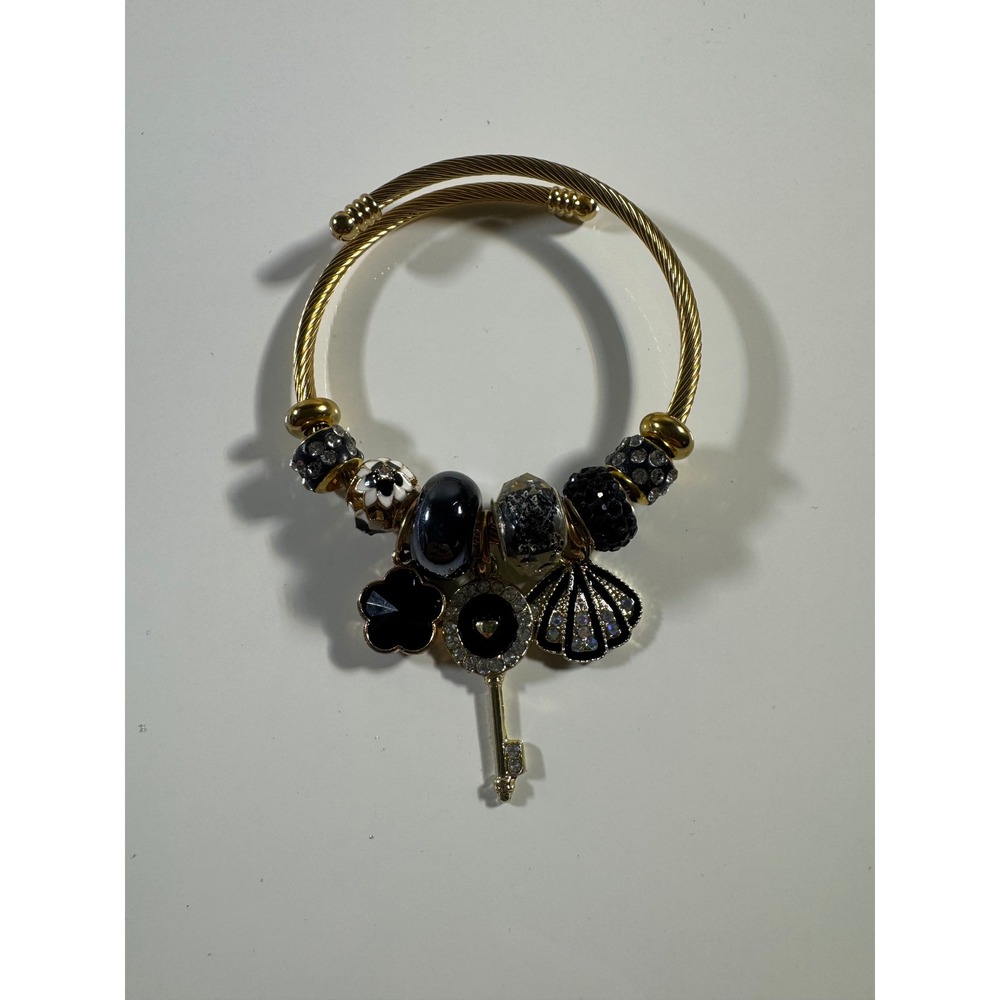 Gold Tone Cable Wire Bypass Bangle Bracelet Black White Charms Key Shell Clover